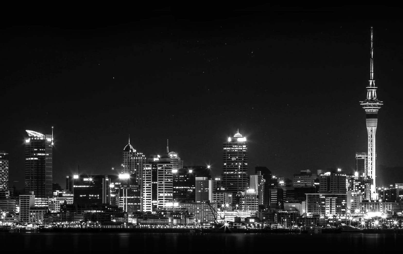 The Auckland city skyline at night, viewed across the Waitematā Harbour